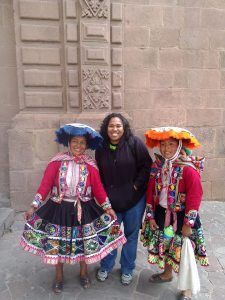 Her in Cusco. I wanted to take a photo with the woman in the blue hat ... the woman in the orange hate photo bombed me! Lol 